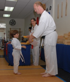 Boy Getting Yellow Belt